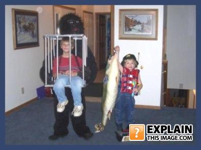 Gorilla-holding-a-cage-and-fisherman-costumes